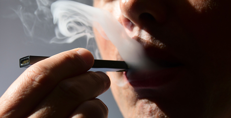 A person using e-cigarette