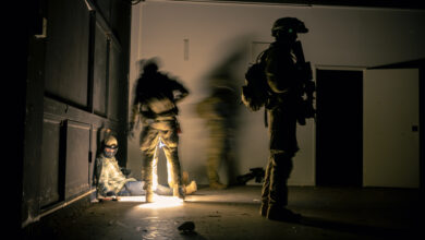 Australian Army soldiers from Charlie Company, 1st Battalion, The Royal Australian Regiment detain a simulated enemy during an urban clearance on Exercise Green Blaze at James Cook University, Townsville, Queensland. *** Local Caption *** Australian Army soldiers from Charlie Company, 1st Battalion, The Royal Australian Regiment conducted live-fire combat shooting serials, full mission profiles and air mobility operations as part of Exercise Green Blaze from 23 Oct  24 Nov 2023 at Lavarack Barracks and Mount Stuart Training Area, Townsville, Queensland.
