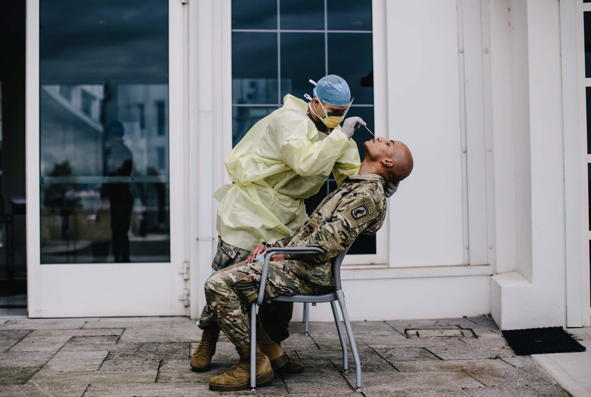 U.S. Army medic paratroopers assigned to 1st Battalion, 503rd Infantry Regiment, 173rd Airborne Brigade conduct COVID-19 testing on 10% of their assigned personnel on Caserma Ederle, Italy, May 15, 2020. The testing helps ensure the brigade is ready for cross country movement when necessary, even under pandemic conditions.