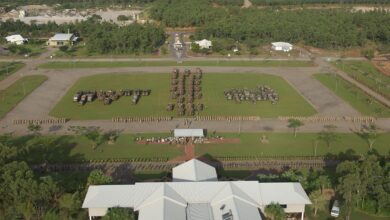 20050408adf8266562_0014.JPG Caption: Deep Caption: Soldiers and their vehicles of the Al Muthanna Task Group (AMTG) parade for the Commander of the 1st Brigade, Brigadier John Cantwell, at Robertson Barracks in Darwin following the completion of their Mission Rehearsal Exercise. The solders are being farewelled prior to their deployment to southeast Iraq, surrounded by their families and fellow members of the 1st Brigade.