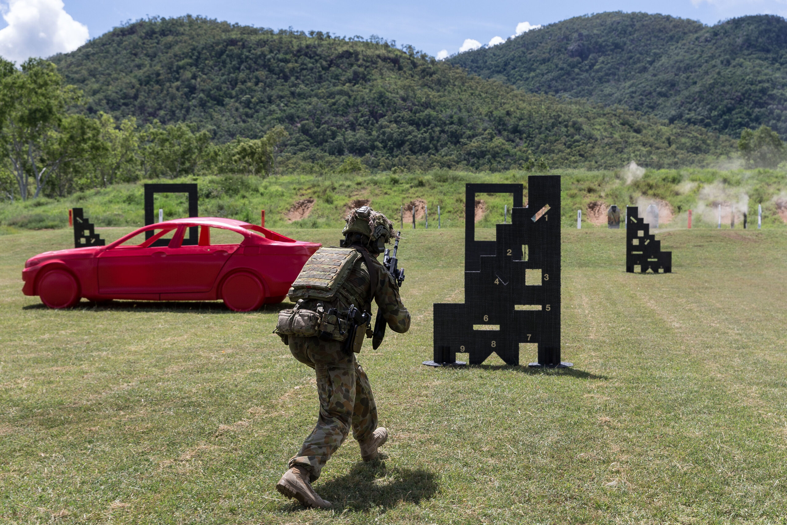 Australian Army officer Lieutenant Andrew Davis from 3rd Battalion, Royal Australian Regiment, runs forward on the combat marksmanship range at Mount Stuart military training area on 7 March 2017. *** Local Caption *** Australian Army soldiers from Townsville's 3rd Brigade are receiving advanced combat shooting skills training at Mount Stuart military training area from 6 - 10 March 2017. The training, conducted by School of Infantry instructors, is using innovative teaching techniques with the latest shooting range technologies to provide the regular infantry soldiers with a near-real immersive combat environment to develop combat shooting skills. After the five-day course, the 3rd Brigade soldiers will continue to impart their knowledge to their sections before deploying to Iraq later this year.