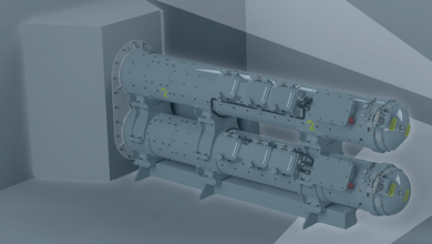 An artist's 3d rendering of a SEA Torpedo Launch System. The gray equipment appears to be two metallic containers shaped like long canisters. They appear to be covered in rivets and small mechanisms.