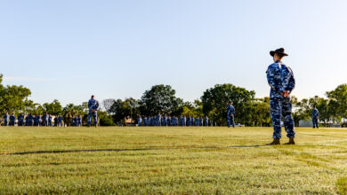 At RAAF Base Tindal, Northern Territory, personnel from No. 17 Squadron stand on parade during the Change of Command ceremony. *** Local Caption *** Wing Commander Shane Smith retired from the ADF after 41 years of service, handing over command of No. 17 Squadron and the role of Senior Australian Defence Force Officer at RAAF Base Tindal. The parade and ceremony on 10 March 2023 celebrated Wing Commander Smiths long career and welcomed the incoming Commanding Officer, Wing Commander Fiona Pearce. Squadron and base personnel, alongside Katherine community leaders, praised Wing Commander Smiths leadership during this defining period in RAAF Base Tindals history.