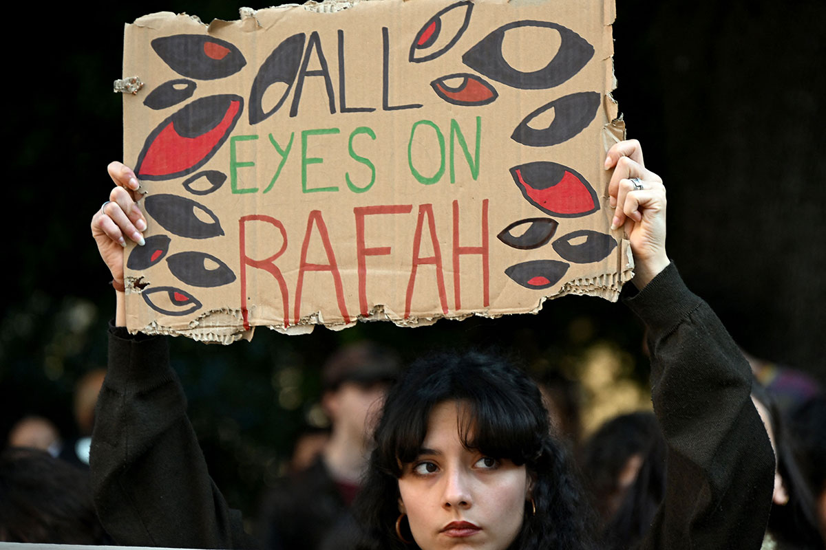 A demonstrator holds up a placard reading "All Eyes on Rafah" during a protest for Palestine