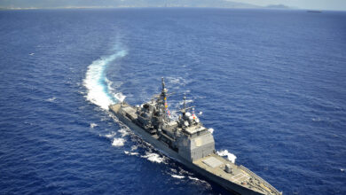 The Ticonderoga-class guided-missile cruiser USS Chosin (CG 65) conducts exercises off the coast of Hawaii following a departure from Joint Base Pearl Harbor-Hickam.