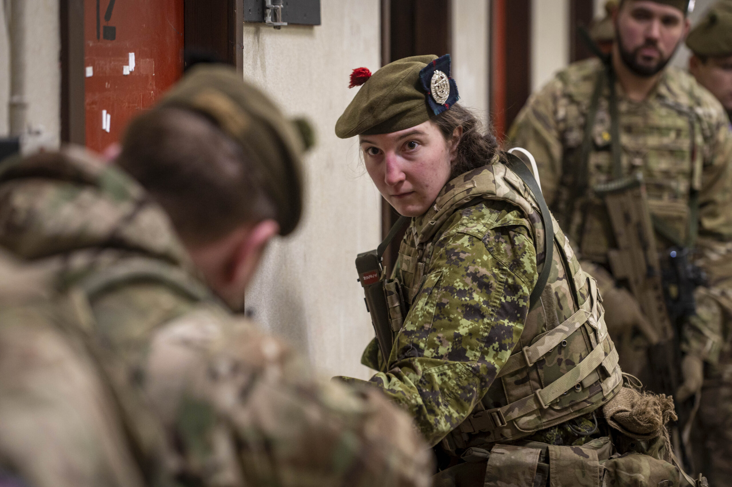 Photo caption:- A Canadian reservist University student is seen here with 7 SCOTS, as part of a Reserve Forces Foreign Exchange Student programme from 48th Highlanders of Canada. Simulation facility in Scotland creates realistic training for Army reservists. The creation and development of a new Army training facility in Dundee saw Reservists from the 7th Battalion, The Royal Regiment of Scotland (7 SCOTS) train in using simulated ammunition. The new facility, located in Oliver Barracks in Dundee, allows urban operations training. It was constructed and designed for the use of simulation to create a realistic environment for soldiers to enhance their infantry skills in advance of deployments in the UK and overseas. 7 SCOTS, although a light role (Reserve) battalion based in Perth are commanded by 19th Light Brigade who form part of 1st (United Kingdom) Division. Training at weekends highlights the immense level of discipline and commitment by reservists within 7 SCOTS; juggling their civilian routine and employment to participate gaining and enhancing transferable employable skills. Reservists bring specialist civilian capabilities that are essential both on and off the battlefield, while gaining transferable qualifications by training with the Army. The roles and tasks demanded of the Army Reserve continue to evolve, with more opportunities to enjoy the challenges that come with being a Reservist both in the UK and worldwide.