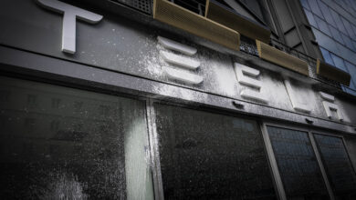 France, Saint-Ouen, 2025/03/16. In the night, activits have vandalized the TESLA showroom in the TESLA headquarters for France. Activitsts threw white paint on the windows. Photography by Arnaud Paillard France, Saint-Ouen, 2025/03/16. Des militants ont vandalise la devanture du showroom du siege de Tesla France dans la nuit du 15 ou 16 mars 2025. De la peinture blanche a ete aspergee sur les vitrines. Photographie par Arnaud Paillard (Photo by Arnaud Paillard / Hans Lucas / Hans Lucas via AFP)