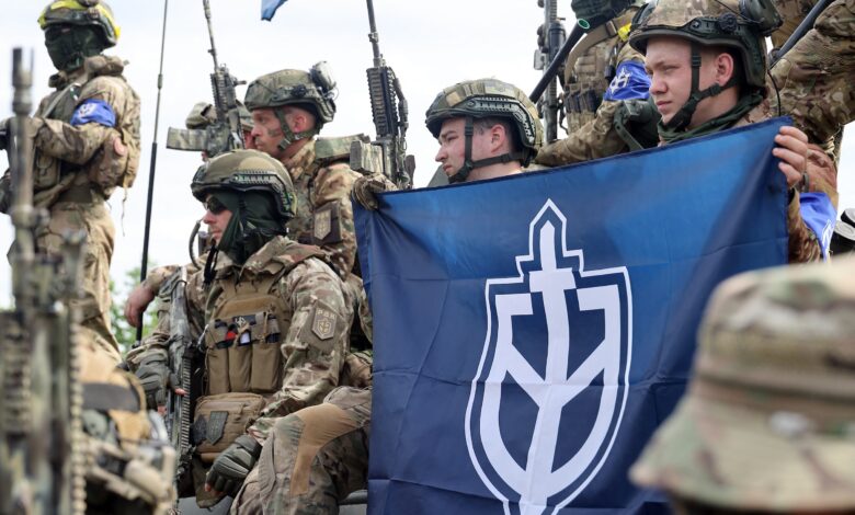 Representatives of the Russian Volunteer Corps (RDK) during a briefing near the border in northern Ukraine