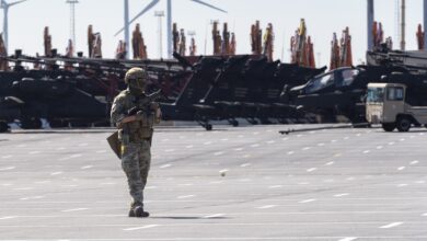 Belgian soldier patrolling an air base