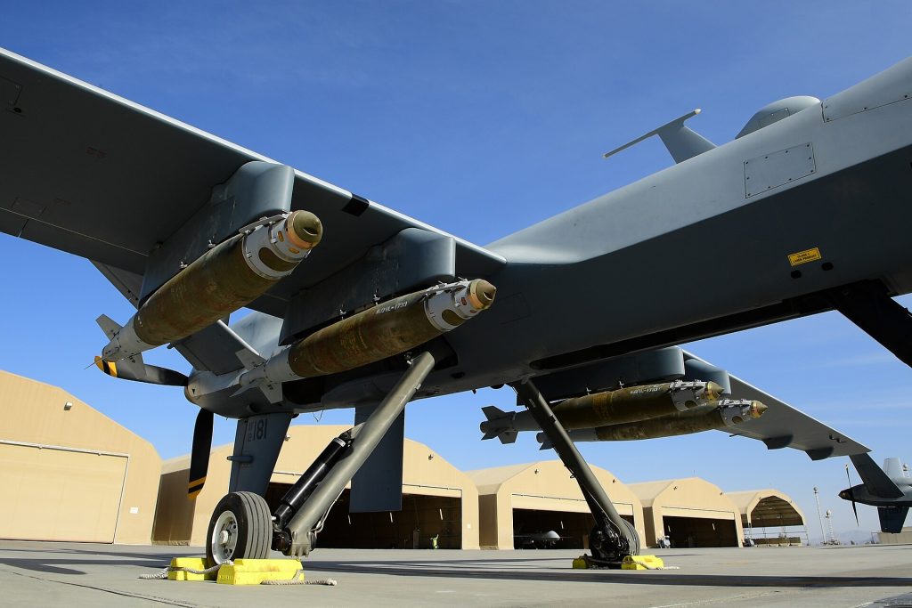 An MQ-9 Reaper, assigned to the 62nd Expeditionary Reconnaissance Squadron, armed with four GBU-38 Joint Direct Attack Munition