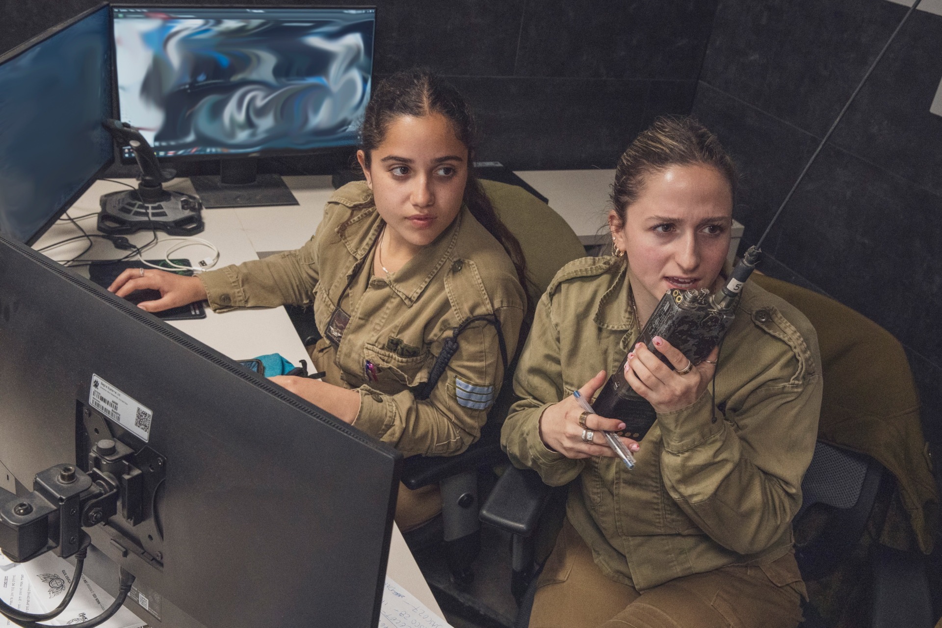 Soldiers with Kosher Kravi, Israeli Defense Force, provide notional fire support to U.S. Marine with 3rd Air Naval Gunfire Liaison Company, U.S. Marine Corps Forces Reserve, during exercise Intrepid Maven 23.2, Feb. 21, 2023. Intrepid Maven is a bilateral exercise between USMARCENT and the IDF designed to improve interoperability, strengthen partner-nation relationships in the U.S. Central Command area of operations and improve both individual and bilateral unit readiness. (U.S. Marine Corps photo by Staff Sgt. Victor Mancilla) (This photo has been altered for security purposes.)